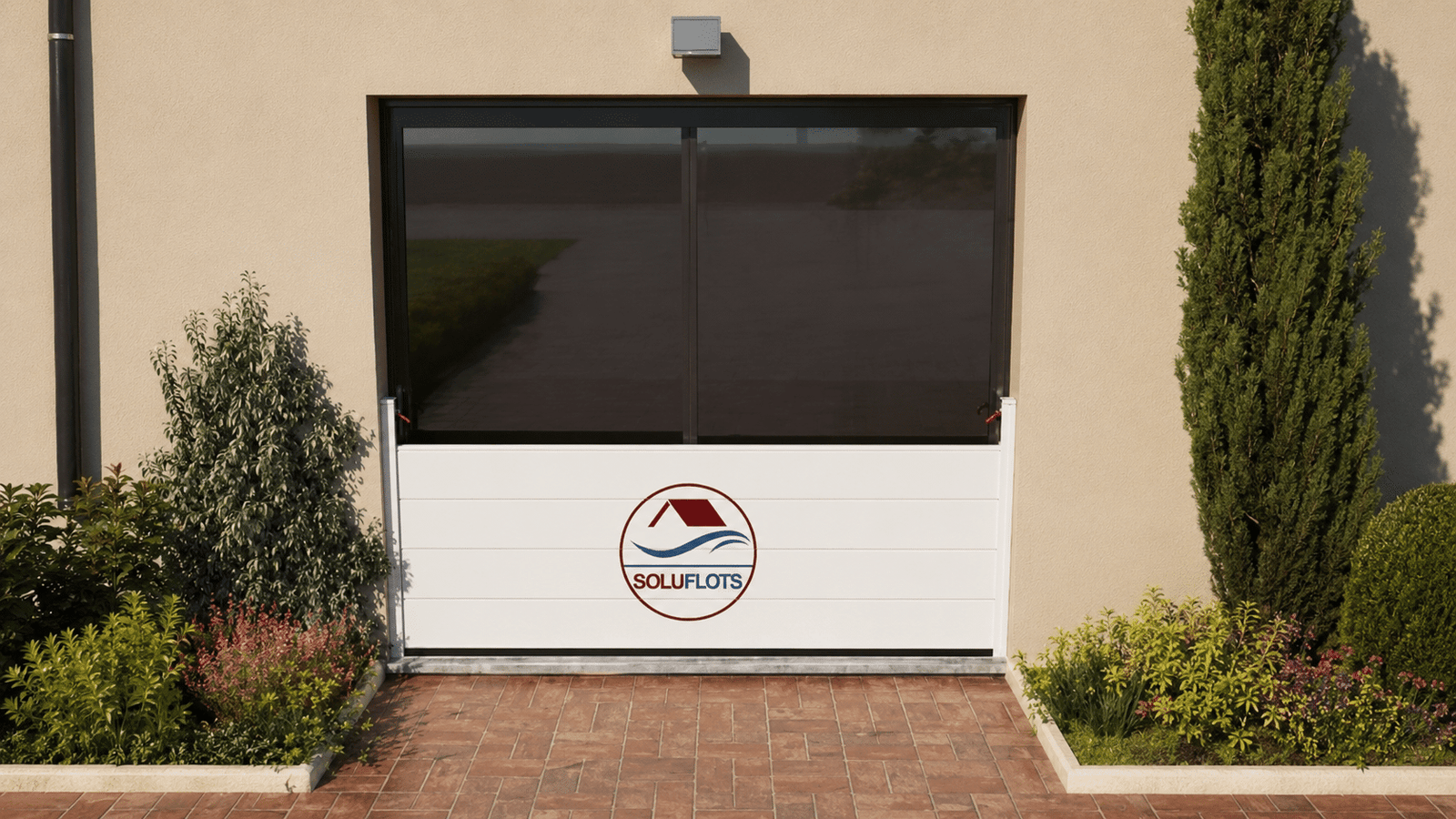 Batardeau SOLUFLOTS sur mesure installé devant une porte de garage